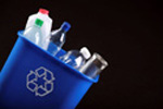 Recycling bin full of bottles