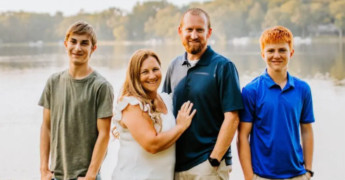 Jason Van Beck is the owner of Capstone Home Improvement. He poses here with his family.