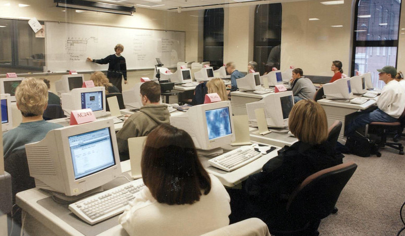 Technology era: Students have access to the 'modern' technology of computers during this class in the 1990s.