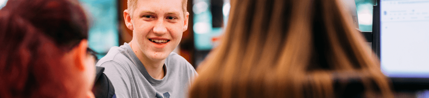 Student smiling widely