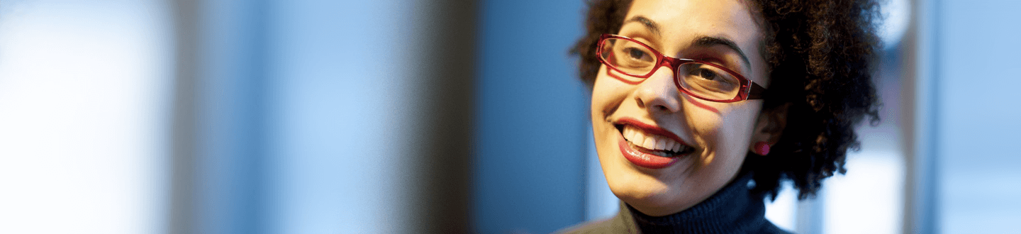 Student smiling widely