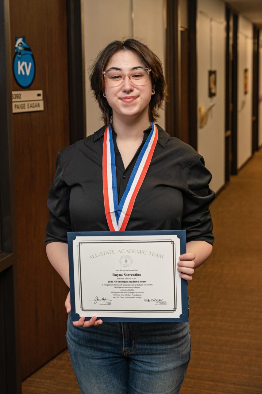 Photo of Rayna Sorrentino holding the award